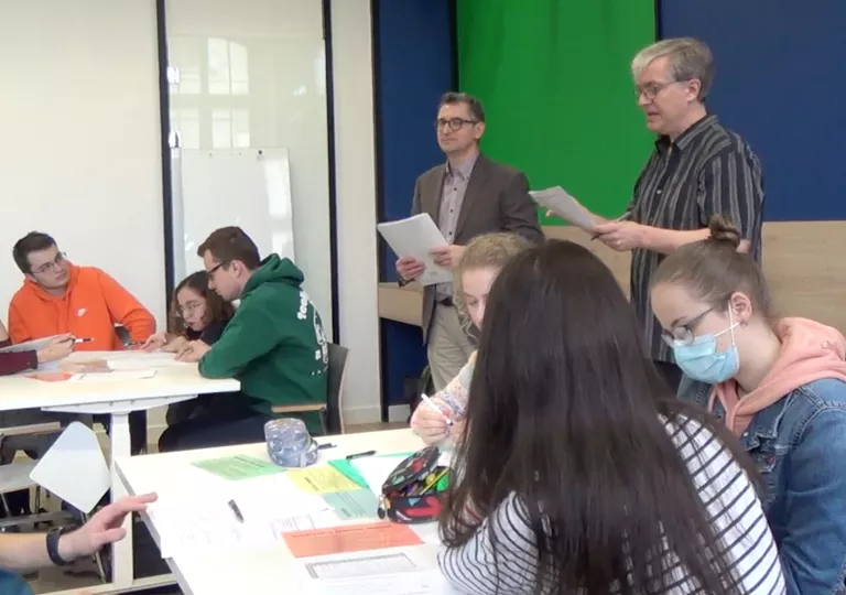 two instructors and students in classroom